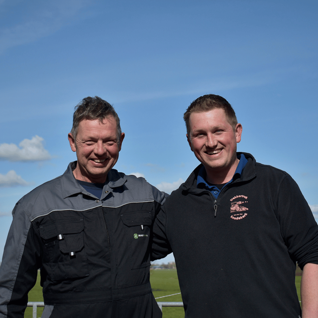 Blije veehouders met hun mestscheider